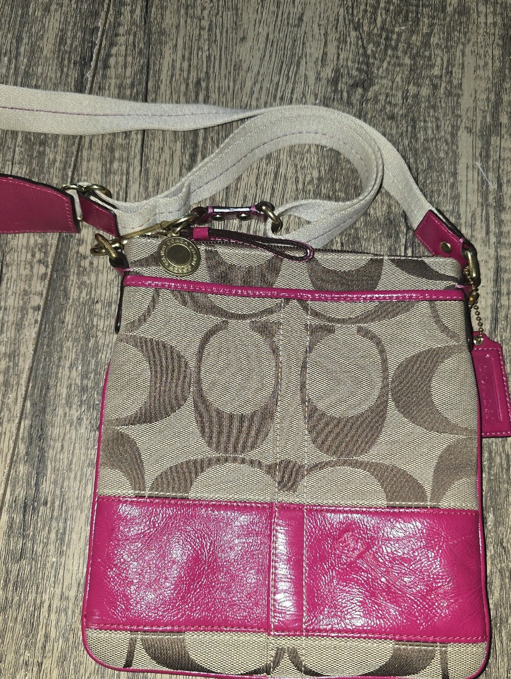Coach brown and magenta cross body purse with Adjustable Straps